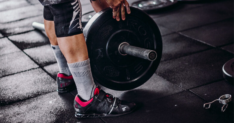 High Reps Vs. Low Reps? What Science Says About Rep Ranges